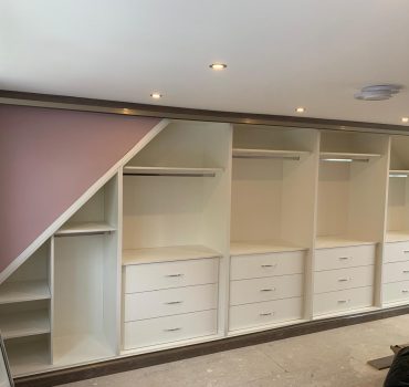 Angled Fitted Wardrobes with Drawers