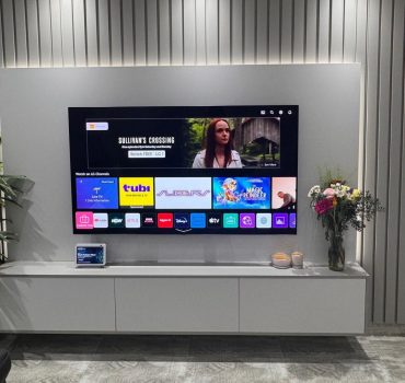 Contemporary Living Room TV Wall with Wooden Slat Accent